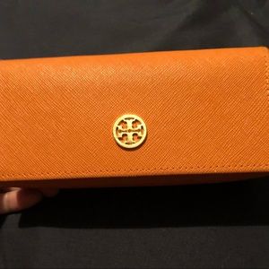 Tory Burch sunglasses.